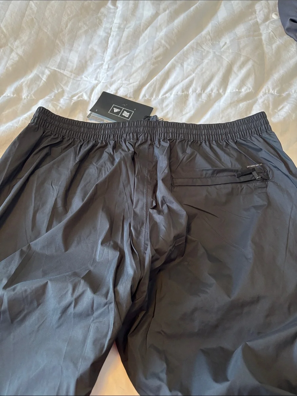 adidas Black Men's Lightweight ClimaProof Rain pants.